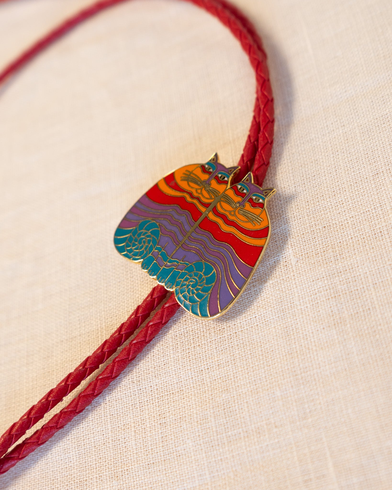 1987 "Rainbow Cats" Laurel Burch Genuine Red Leather Bolo Tie