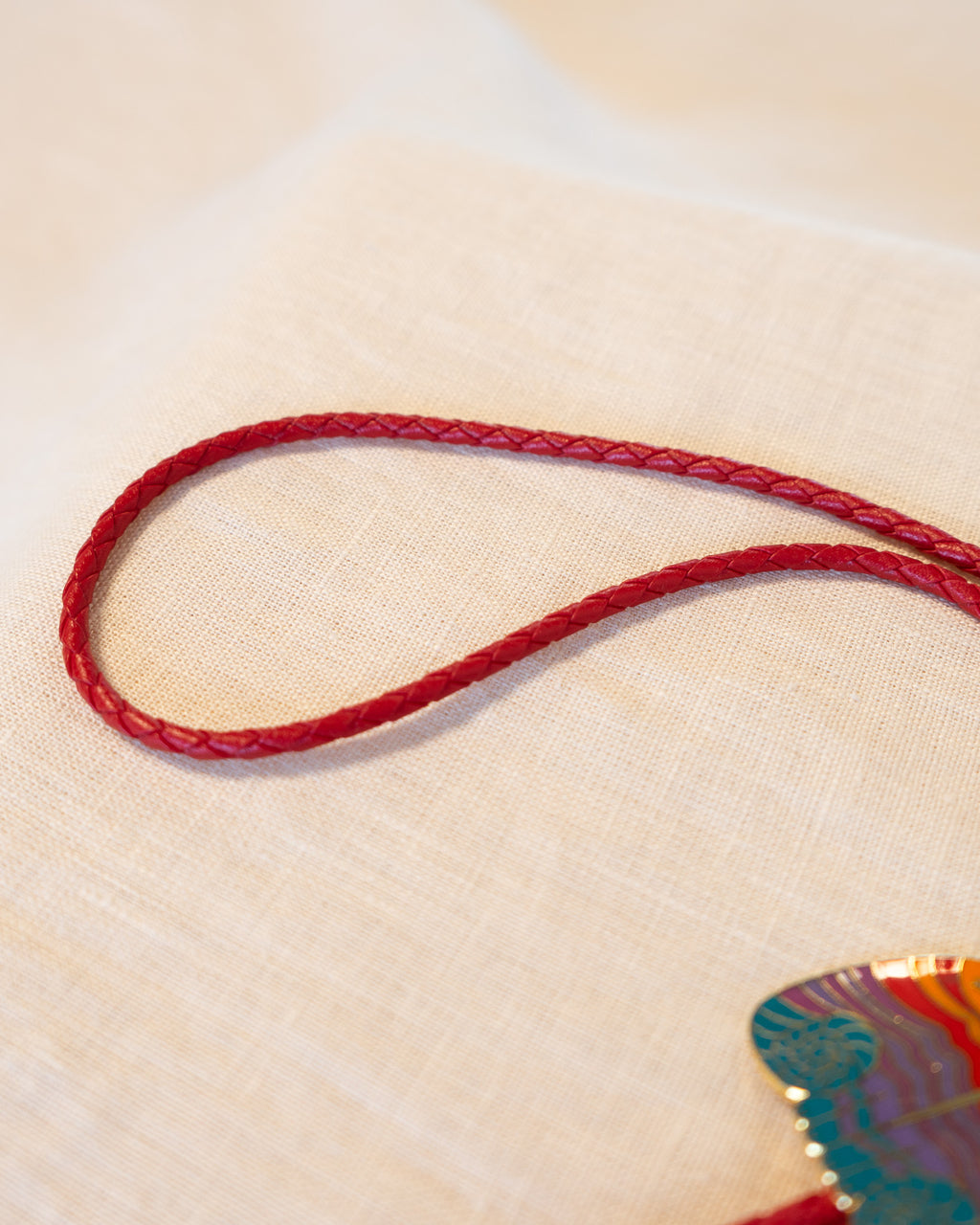 1987 "Rainbow Cats" Laurel Burch Genuine Red Leather Bolo Tie