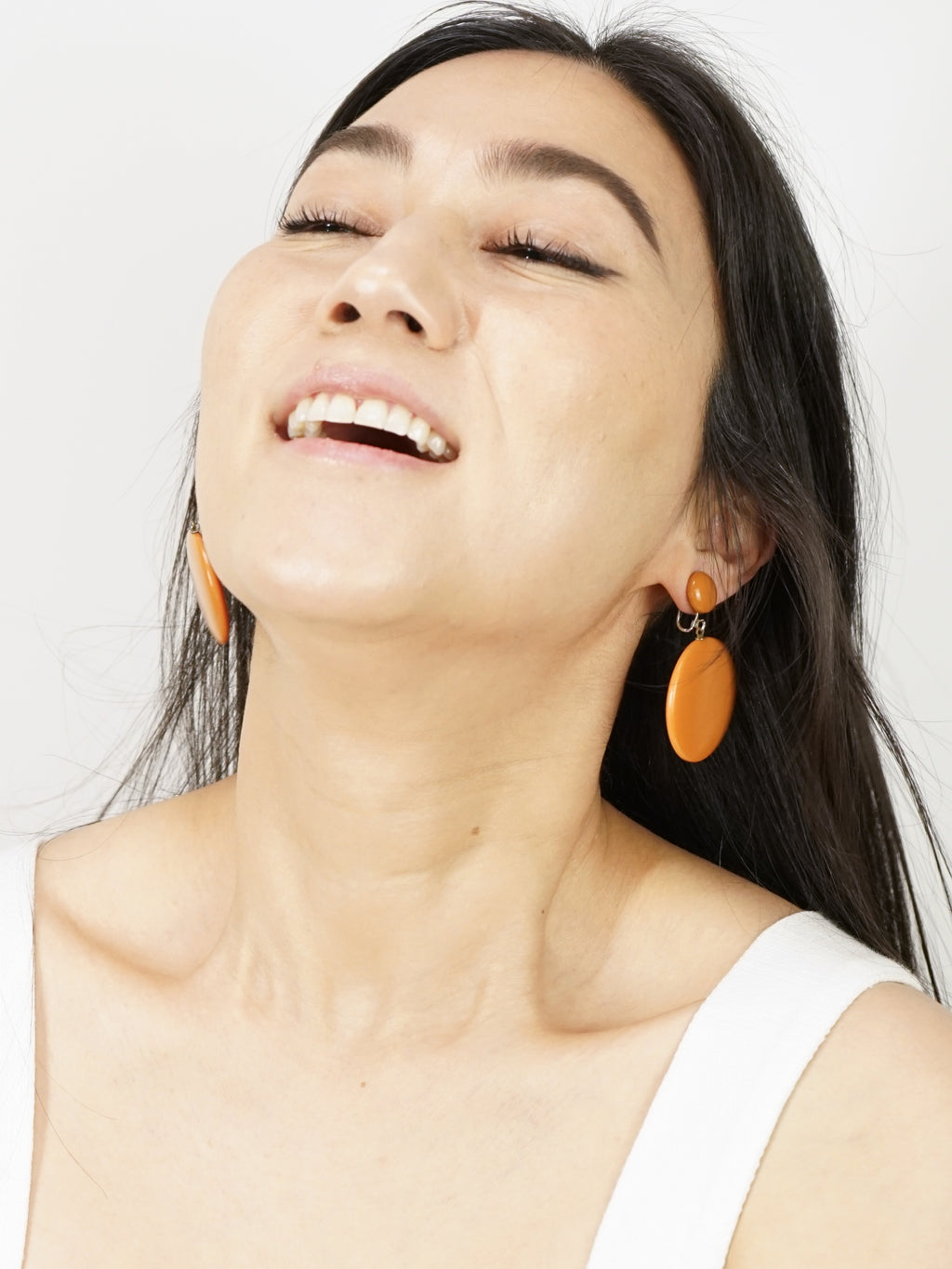 1960s Orange Bakelite Disc Earrings