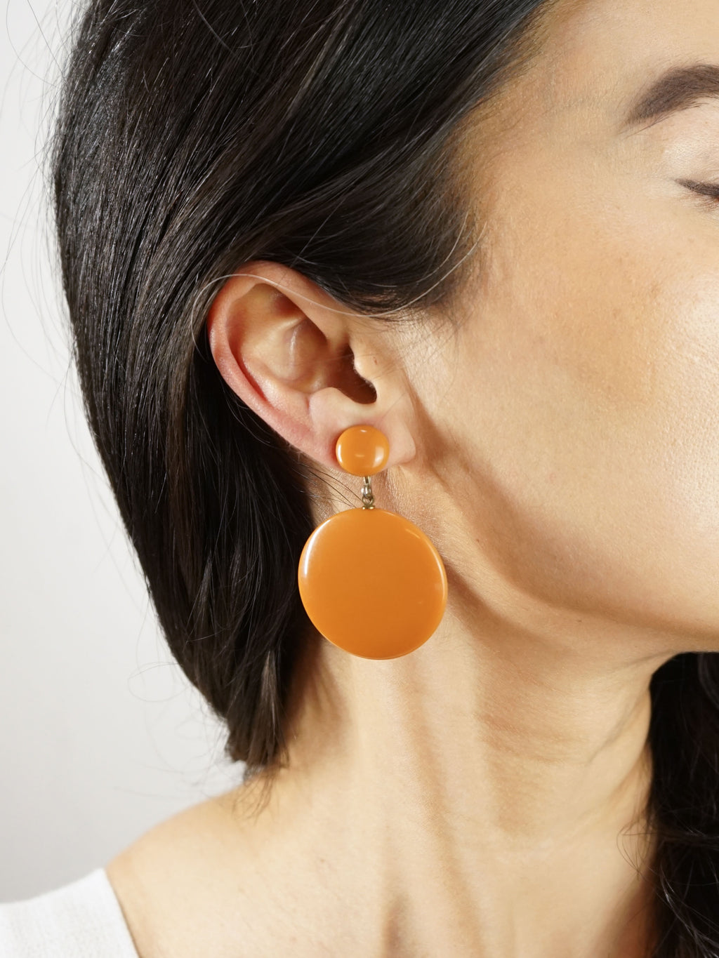 1960s Orange Bakelite Disc Earrings